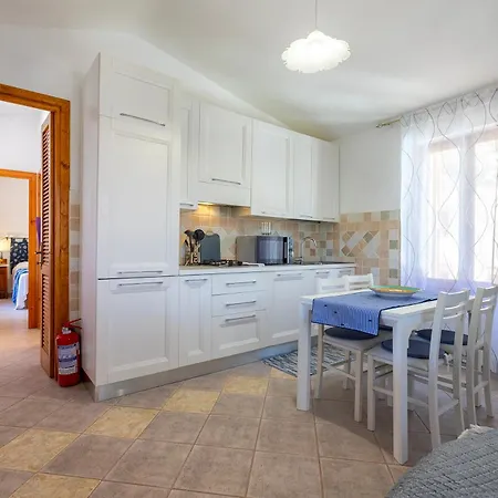 Nyaraló Casa Con Terrazza Nella Pineta